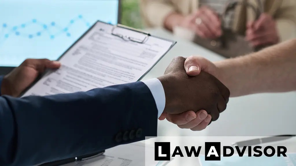 Business partners shaking hands after agreement, symbolizing a formal partnership arrangement and mutual trust.