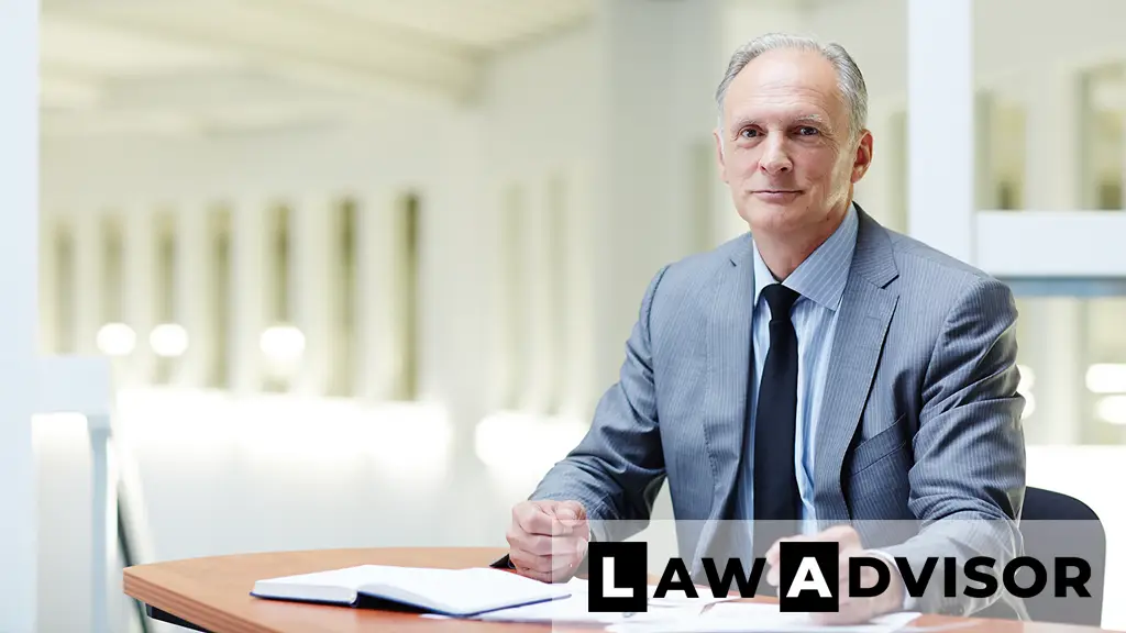Business professional reviewing legal documents, representing the role of an executor in managing estate responsibilities.