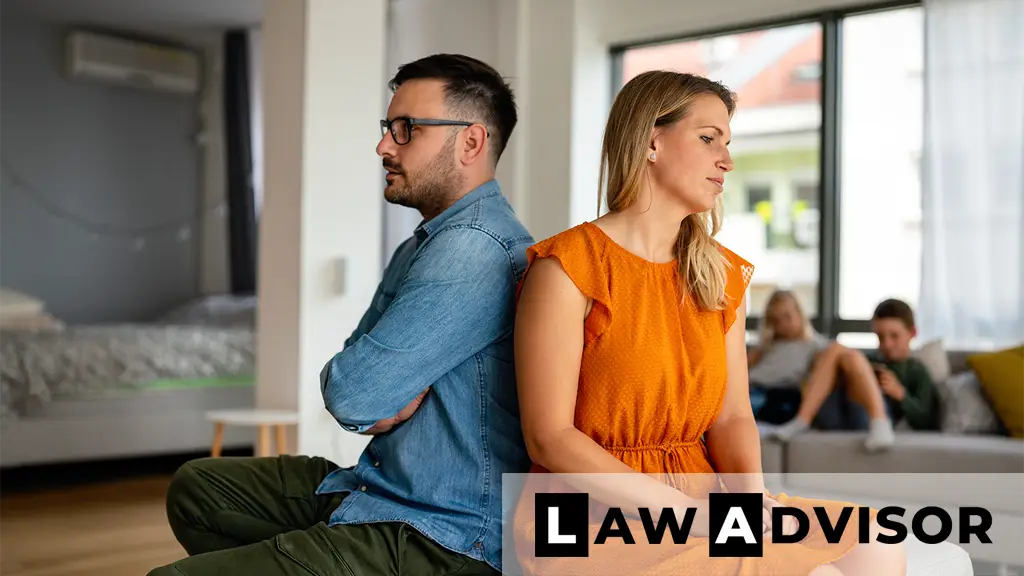 Sad couple sitting apart while thinking about how to file for divorce by state