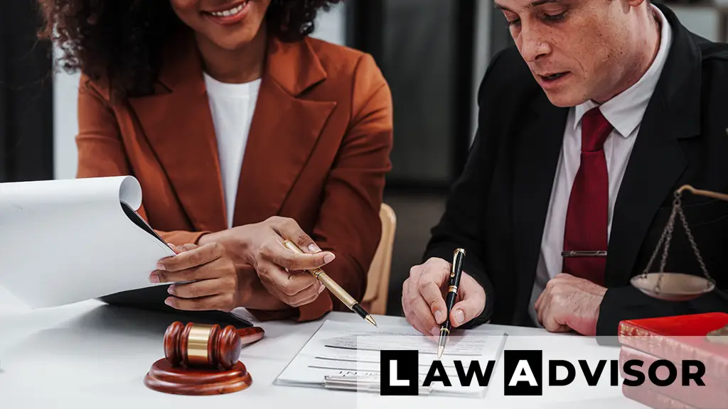 Lawyer preparing a last will and testament document at a desk, representing legal assistance with estate planning and will creation.