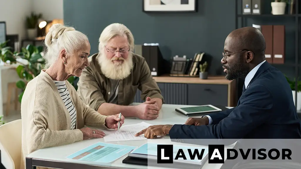 Senior woman signing a legal document at a meeting