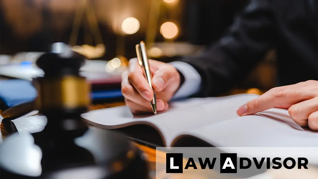 Man signing a legal document, representing the formal process of creating a last will and testament.